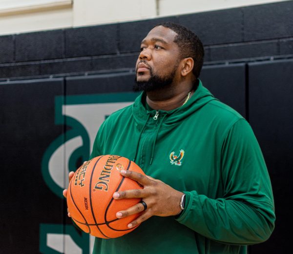 After being head coach of the Free State boys basketball team last year, KU Alum, Sherron Collins resigned and former Hayden high boys basketball head coach, Dwayne Paul took the position.