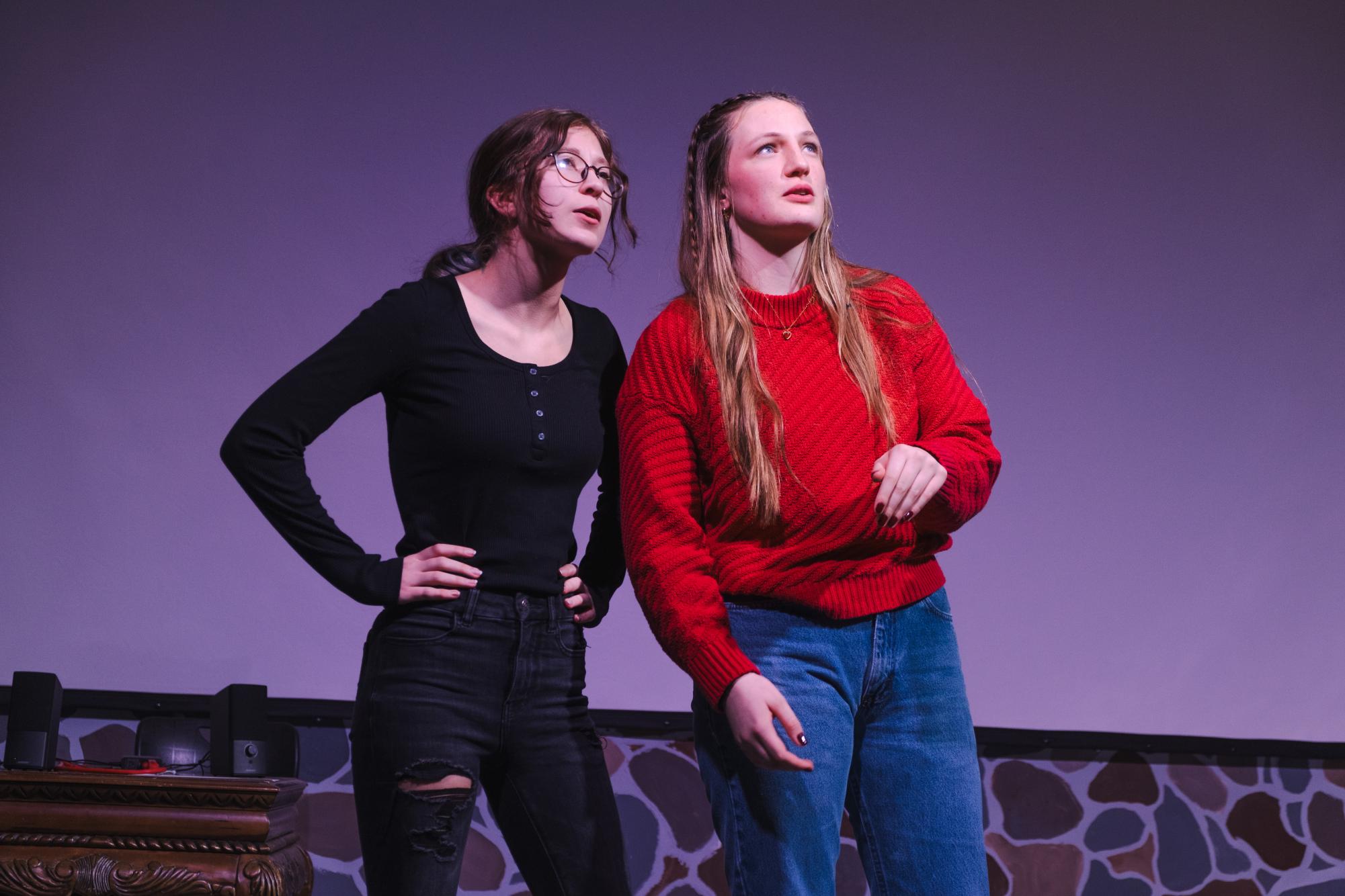 At the Kansas Thespian Festival Showcase, seniors Natalie Riley and Liz Wyle improvise a conversation. The night before leaving for KTF the theater department held a showcase of the students who would be performing at the festival.