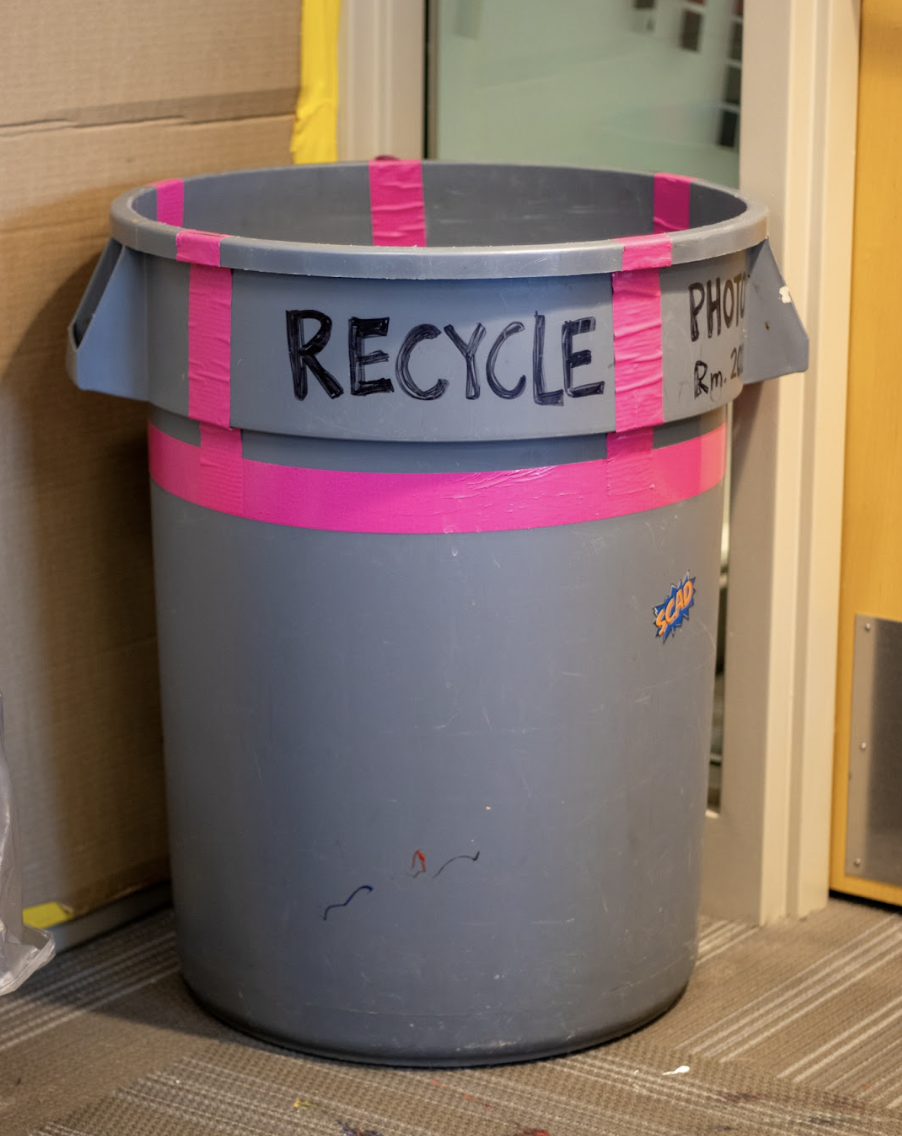 Sitting in the corner of classrooms, some staff say their recycling bins go untouched by groundsmen.