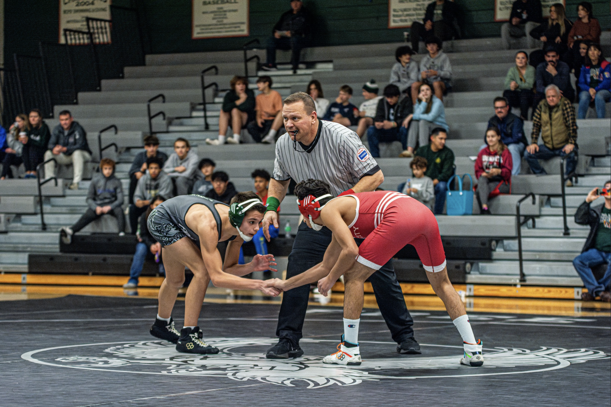 Junior Brayden Wilcox prepares to take on his opponent at the first home boys varsity wrestling meet of the season. The Firebirds came out on top, winning 54-24 overall.

