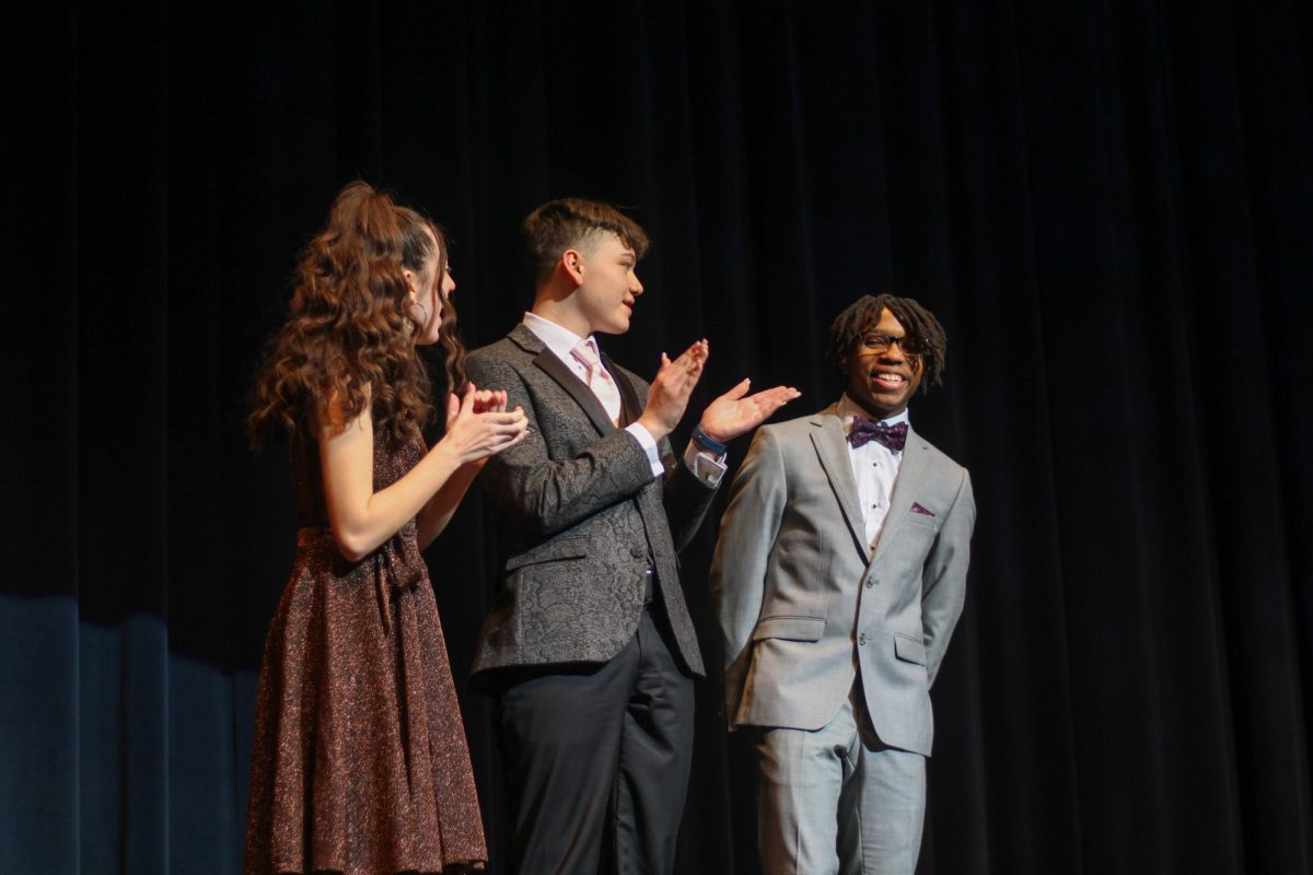 On stage at the Lied Center, candidates react to the announcement of the Youth of the Year winner, La’Ron Williams. This was La’Ron’s second year as a candidate for the award. 
