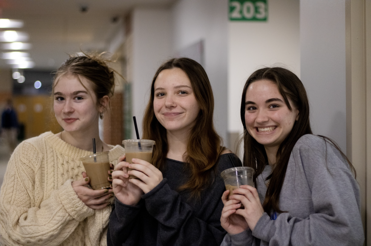 Members of the Free State Journalism staff taste test the new coffee options at school. 