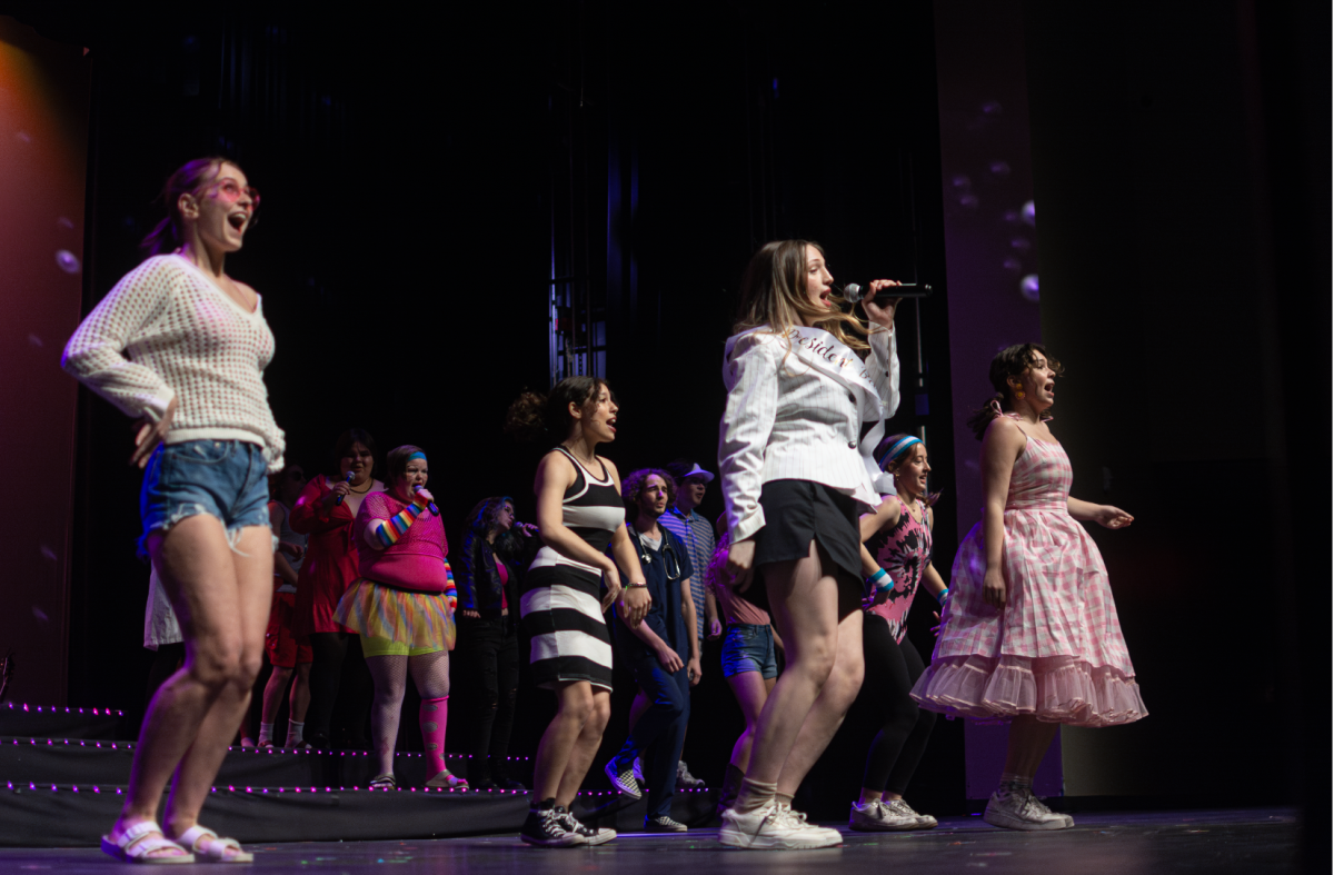 Choir students preform during opening night of Encore on March 20. 