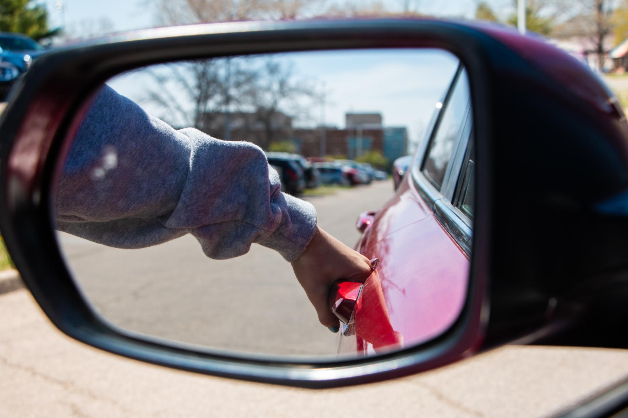 Individual getting into their car in the Free State parking lot.