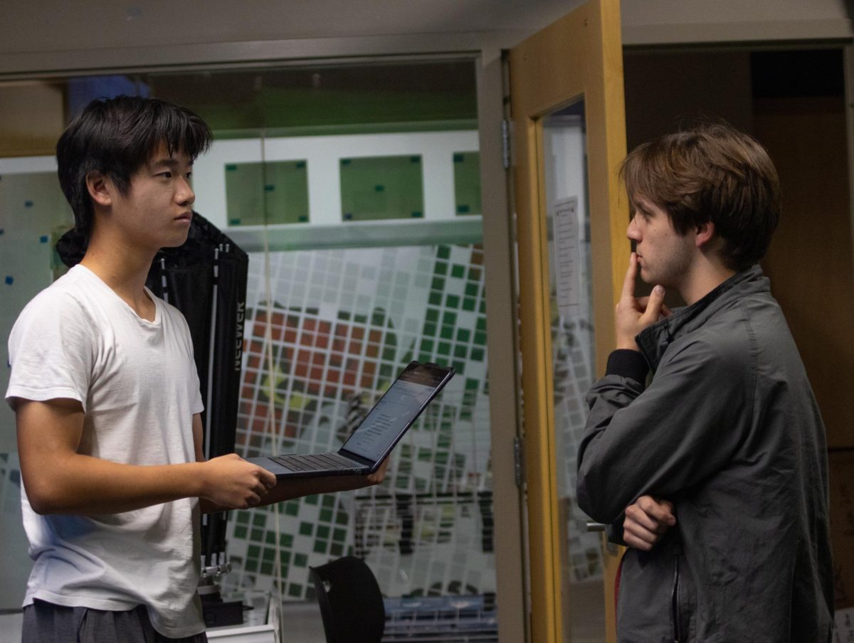 Brainstorming, seniors Jacob Wang and Pryce Brinkheroff discuss their film.