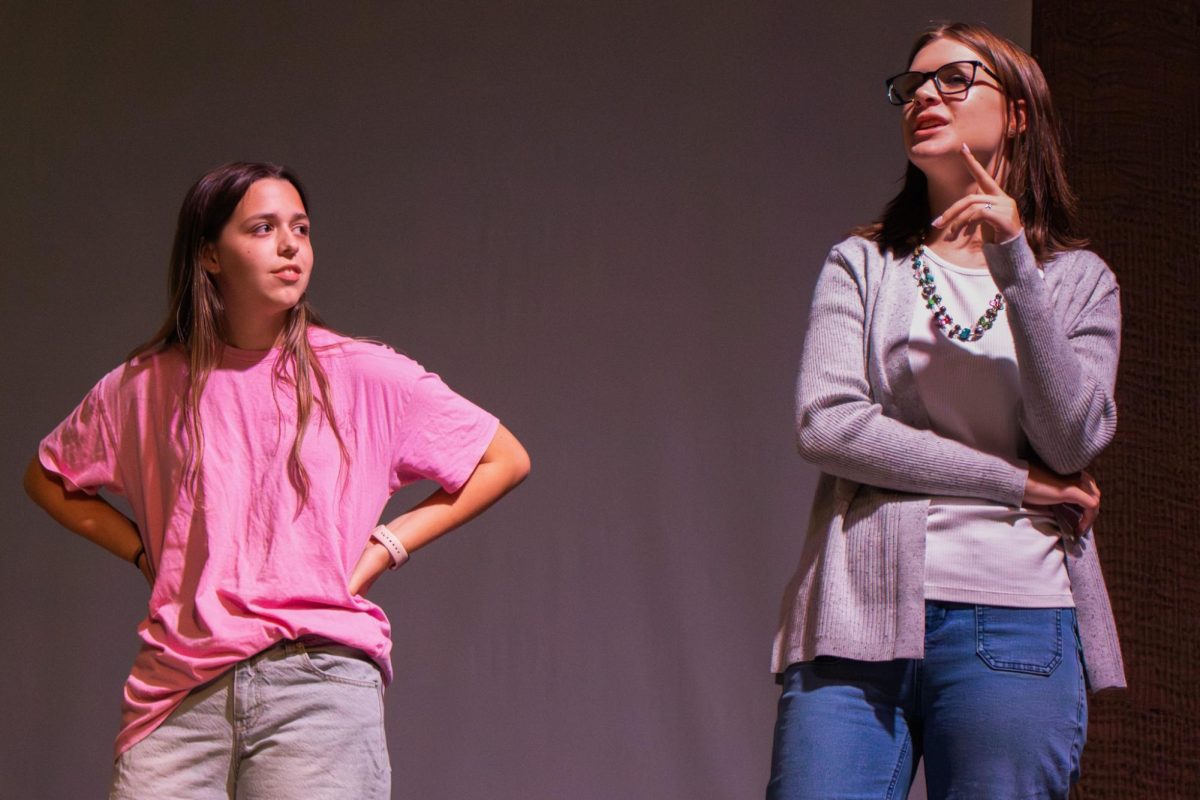 Performing a scene, freshman Olivia Frits and sophomore Cleo Green act in "Home Hunters" at Black Box Theatre Festival.