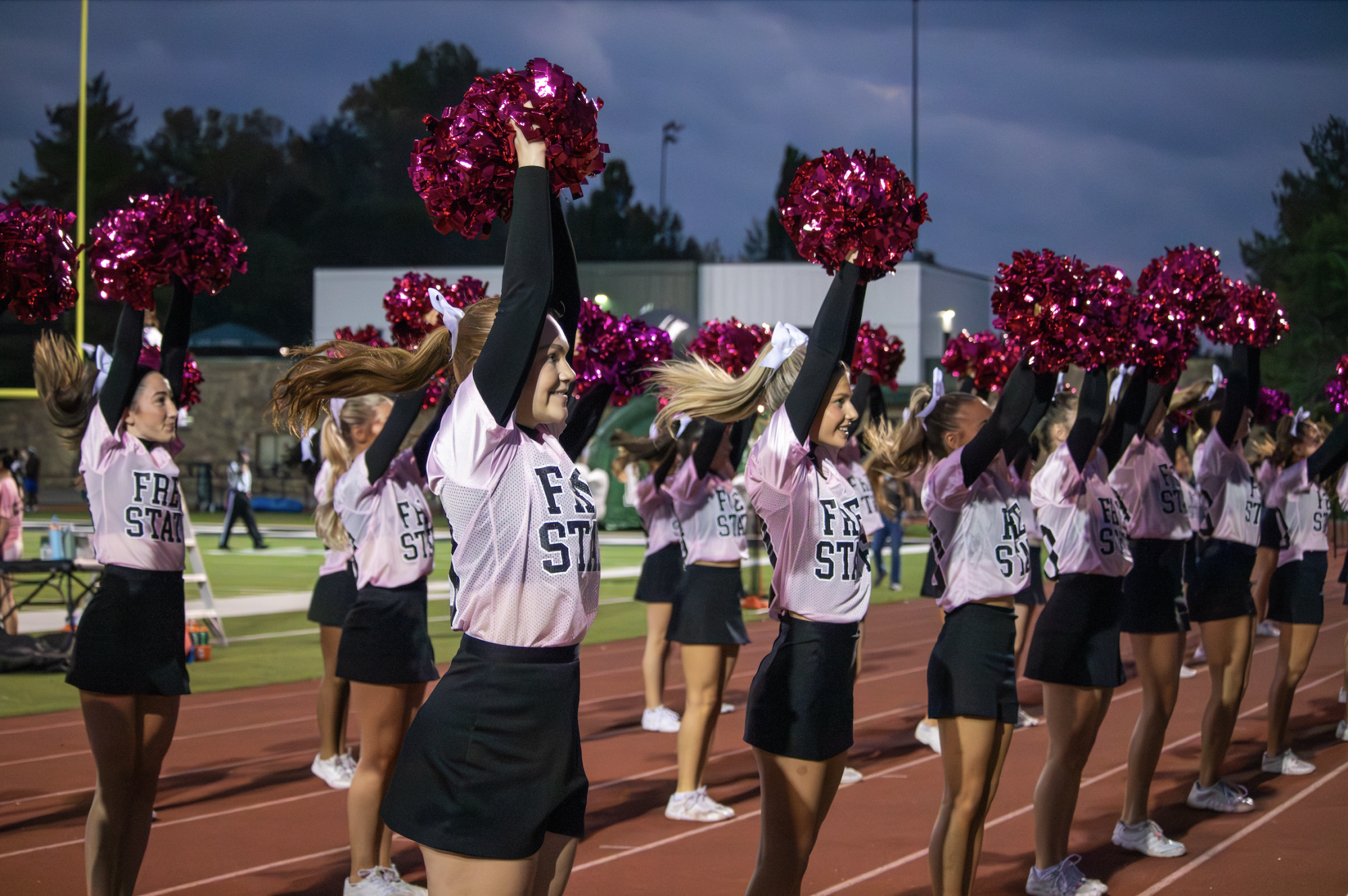 In the middle of the game, members of the spirit squad hype up the crowd.
