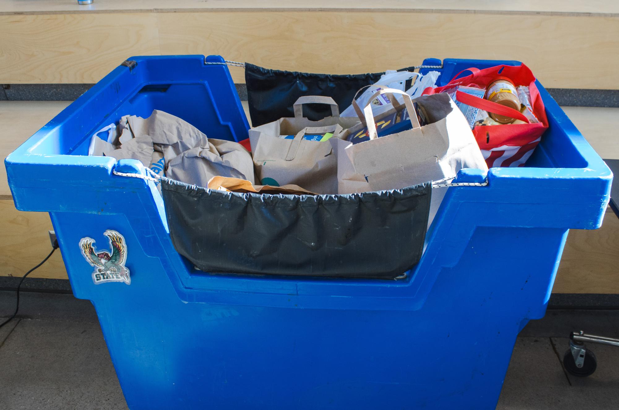 Full of donations, a bin is supplied by students participating in the SNAP Back food drive organized by StuCo. 
