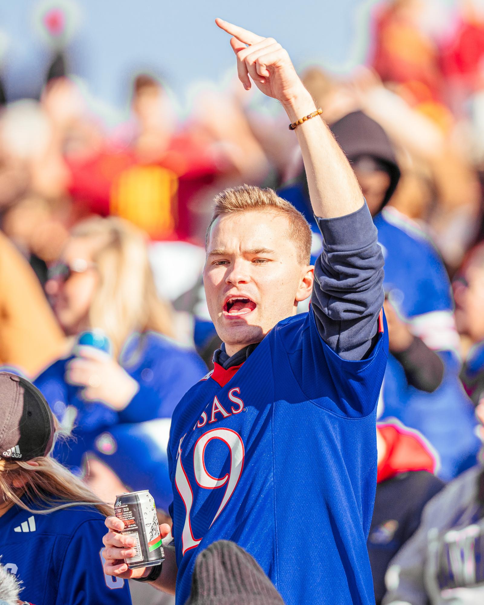 During a football game versus Iowa State on Nov. 22, a fan cheers on the Jayhawks.