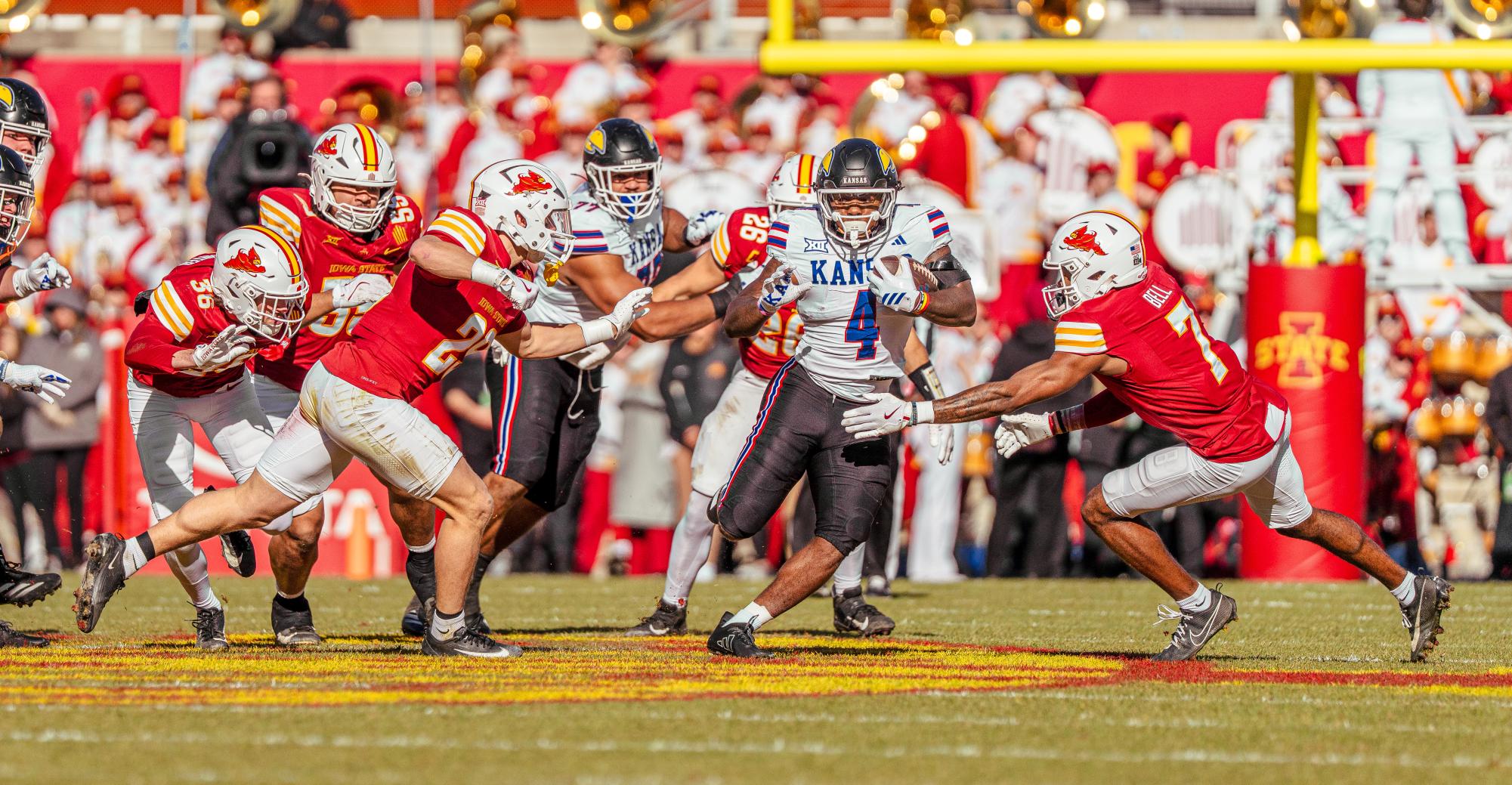 After the snap, University of Kansas running back Leshon Williams runs with the ball during a football game against Iowa State on Nov. 22. The Jayhawks lost 38-14.